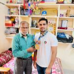 Mohammed Hussamuddin with his father at his home in Nizamabad, Telangana