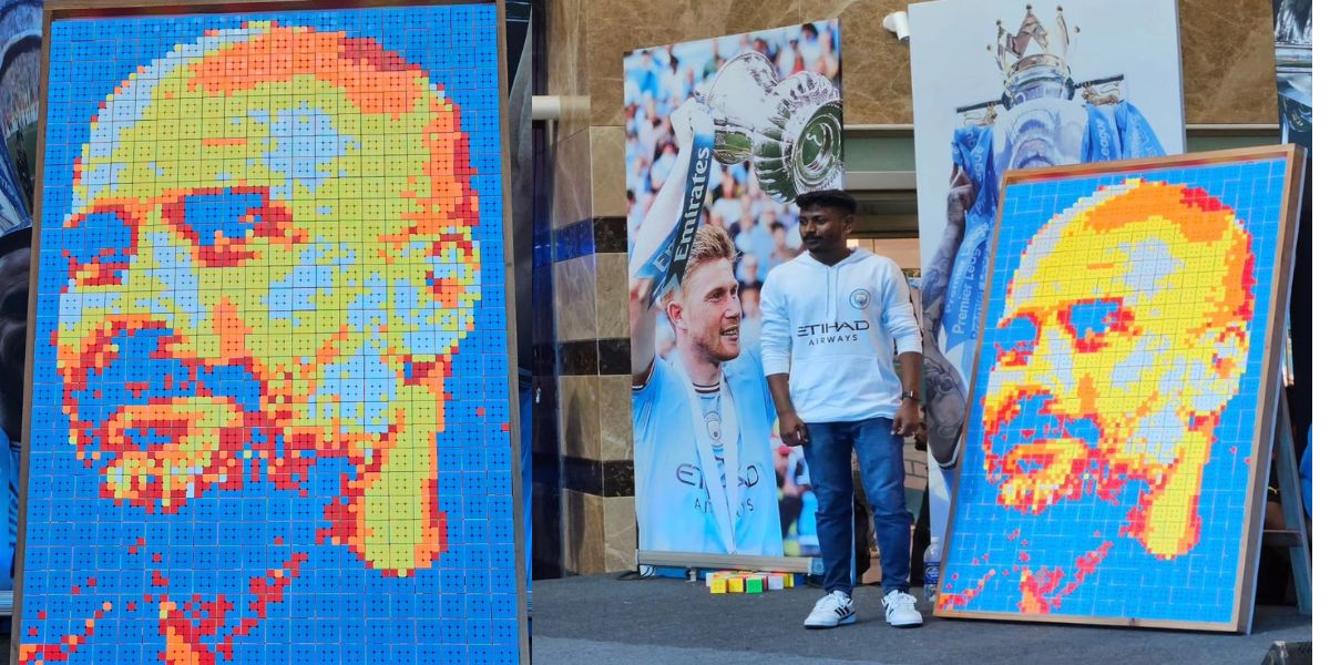 The collage of Pep Guardiola. Ajay V John near his collage. (Supplied) Pep Guardiola birthday wish collage