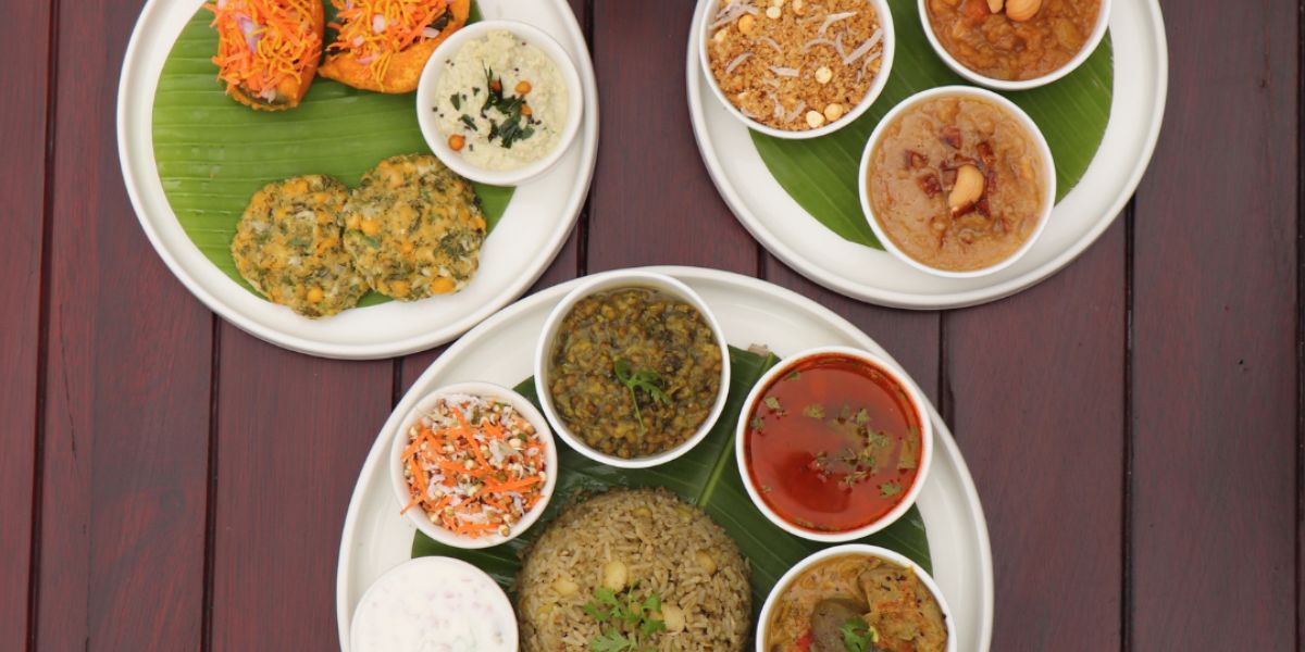 Chef Dinesh Poojary's rendition of the Sankranti oota comprised 8 specially-curated dishes, 2 staples and 3 desserts. (Supplied)