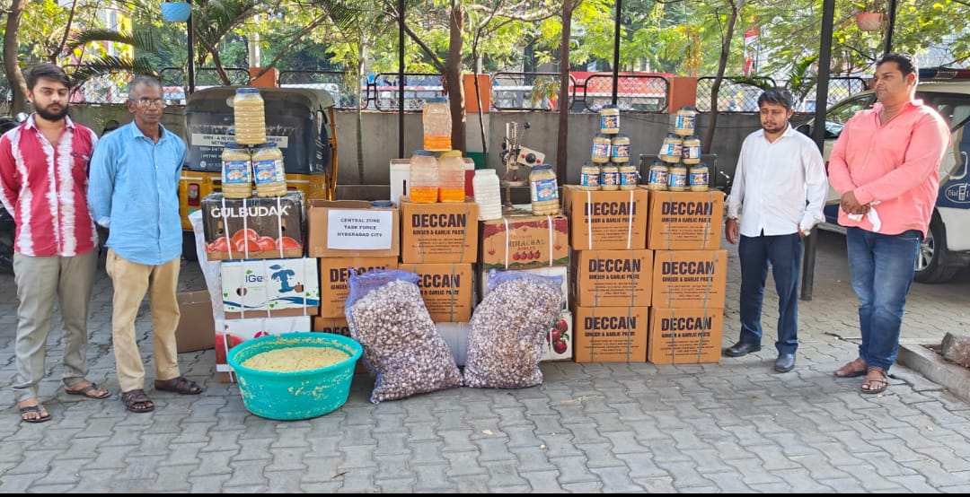 Four accused with the seized adulterated food items.