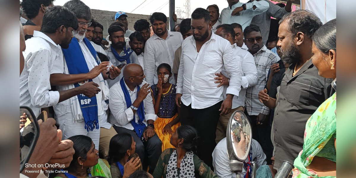 BSP state president RS Praveen Kumar with a child victim who was bleeding after the assault. (Supplied) BSP state president RS Praveen Kumar with a child victim who was bleeding after the assault. (Supplied)
