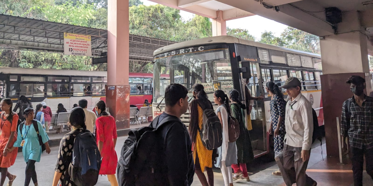 Women waiting to board an RTC bus at ECIL depot. (Deepika Pasham/South First) Women waiting to board an RTC bus at ECIL depot. (Deepika Pasham/South First)