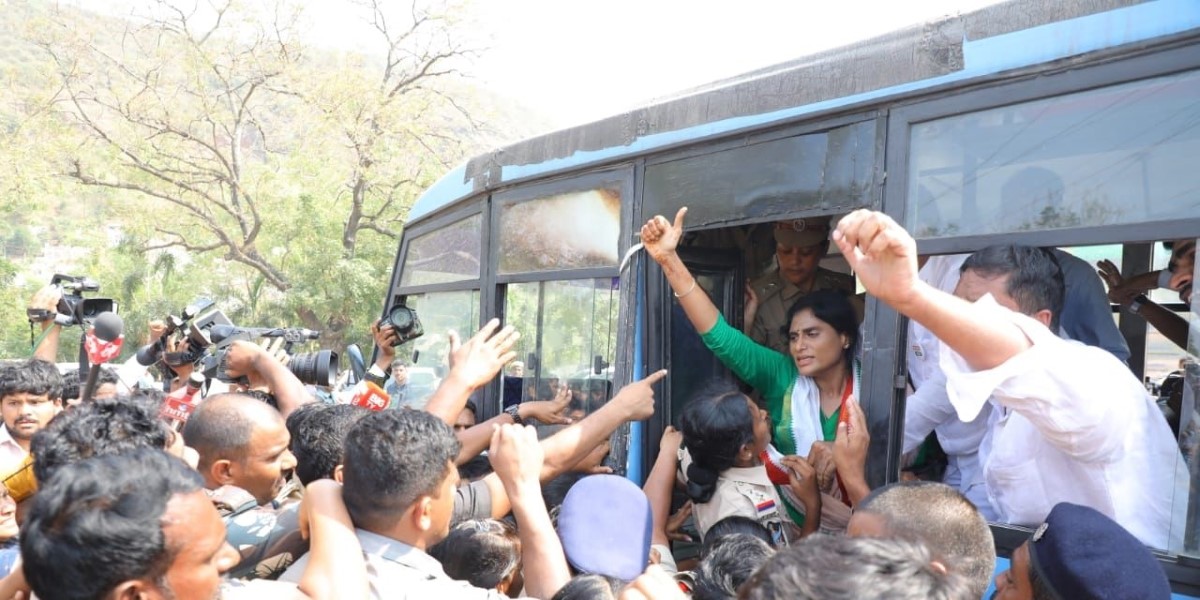 APCC chief YS Sharmila being detained by the police APCC chief YS Sharmila being detained by the police