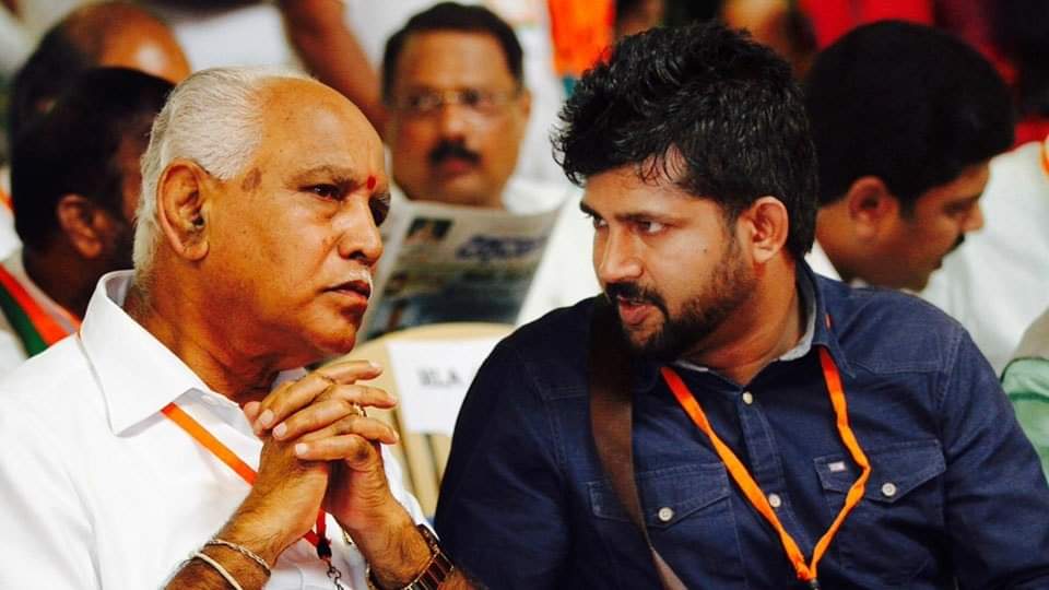 Mysuru MP Pratap Simha with BS Yediyurappa. (File pic/supplied)