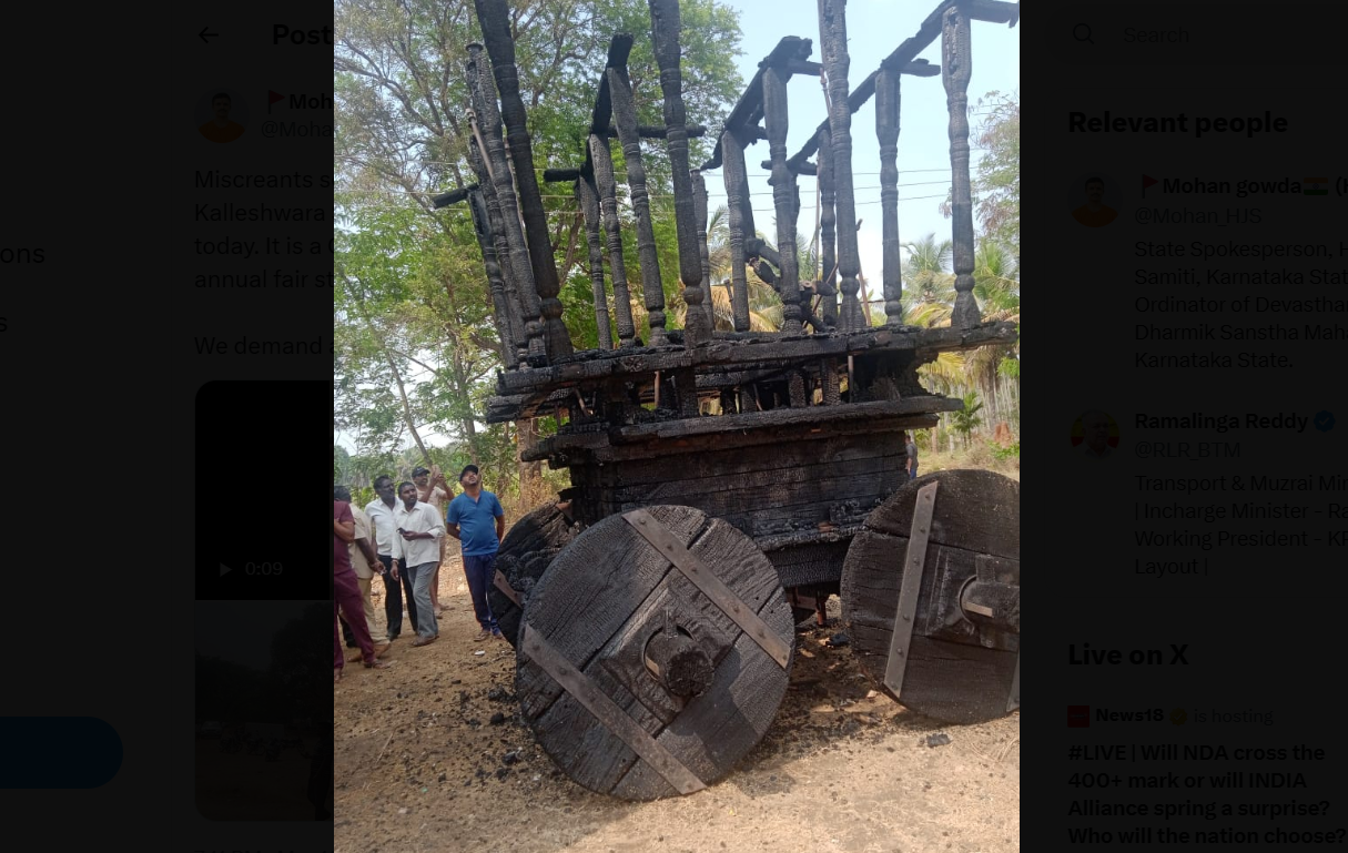 Villagers overlooking the burnt chariot at the Kalleshwara Temple in Tumakuru