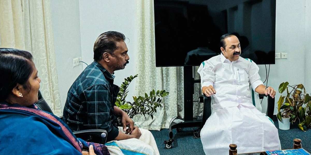 Siddharthan's parents with Lop VD Satheesan.