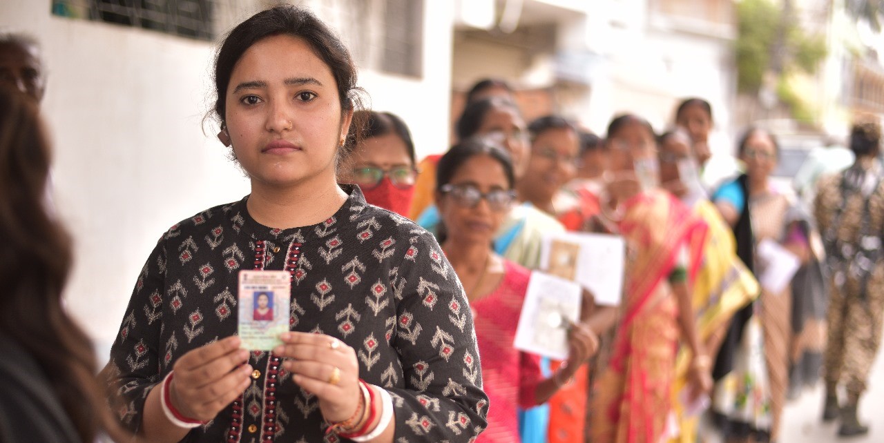 A voter displaying her ID while waiting in queue to vote. Bypolls to Palakkad Assembly Constituency postponed