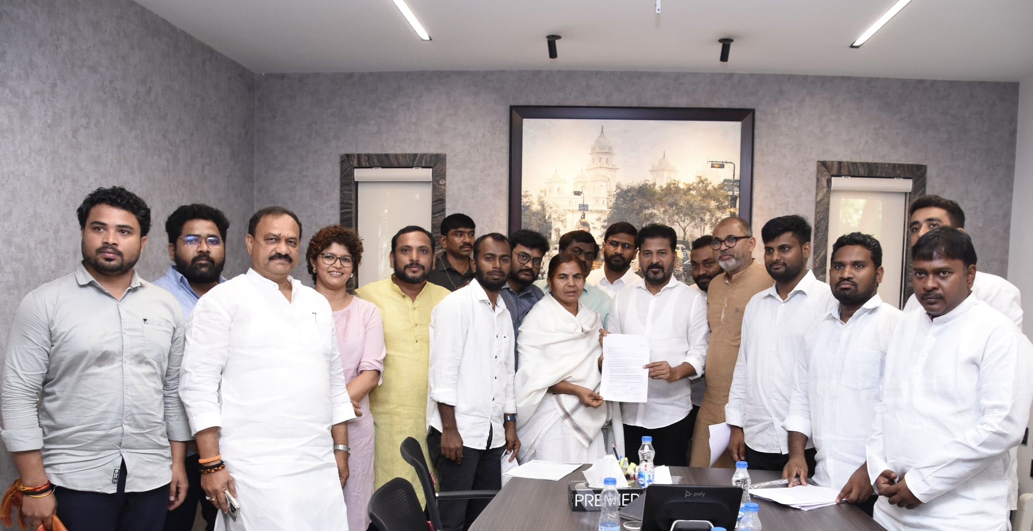 Rohit's mother Radhika Vemula handing over a memorandum to Chief Minister A Revanth Reddy on Saturday, 4 May. (X)