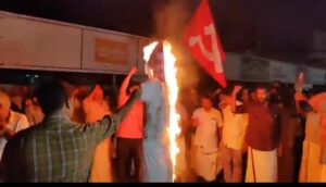 CPI(M) supporters burning the effigy of PV Anvar MLA at Malappuram
