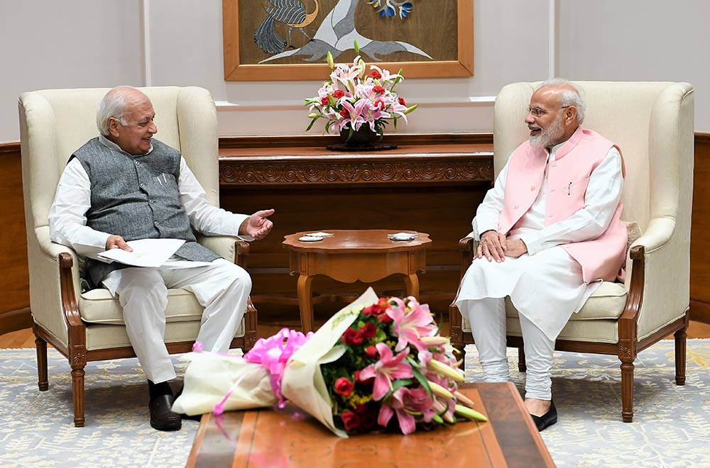 DSC_7355 Governor Arif Mohammad Khan and Prime Minister Narendra Modi. If the Union government decides to extend Khan’s tenure, it would be a calculated gamble.