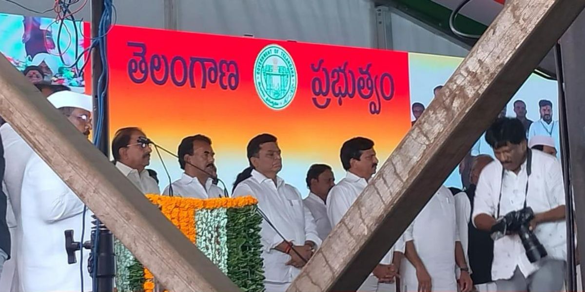 The LED screen with Telangana government logo at an event in Gandhi Bhavan. (X) The LED screen with Telangana government logo at an event in Gandhi Bhavan. (X)