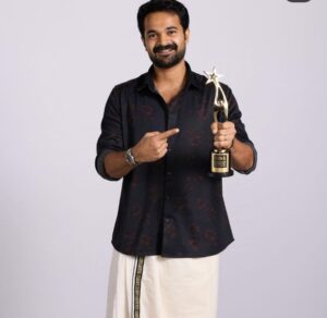 Hakim Shahjahan with the SIIMA award
