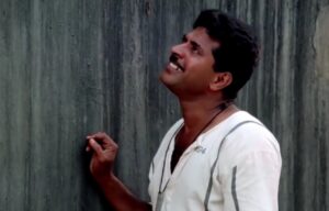 Mammootty as Vaikom Muhammad Basheer in 'Mathilukal' (1990)
