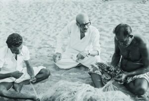 Basheer with fishermen.