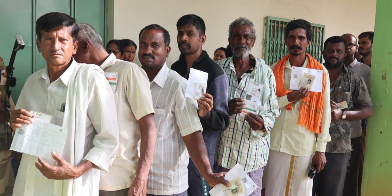 Voters in a polling booth in Karnataka.