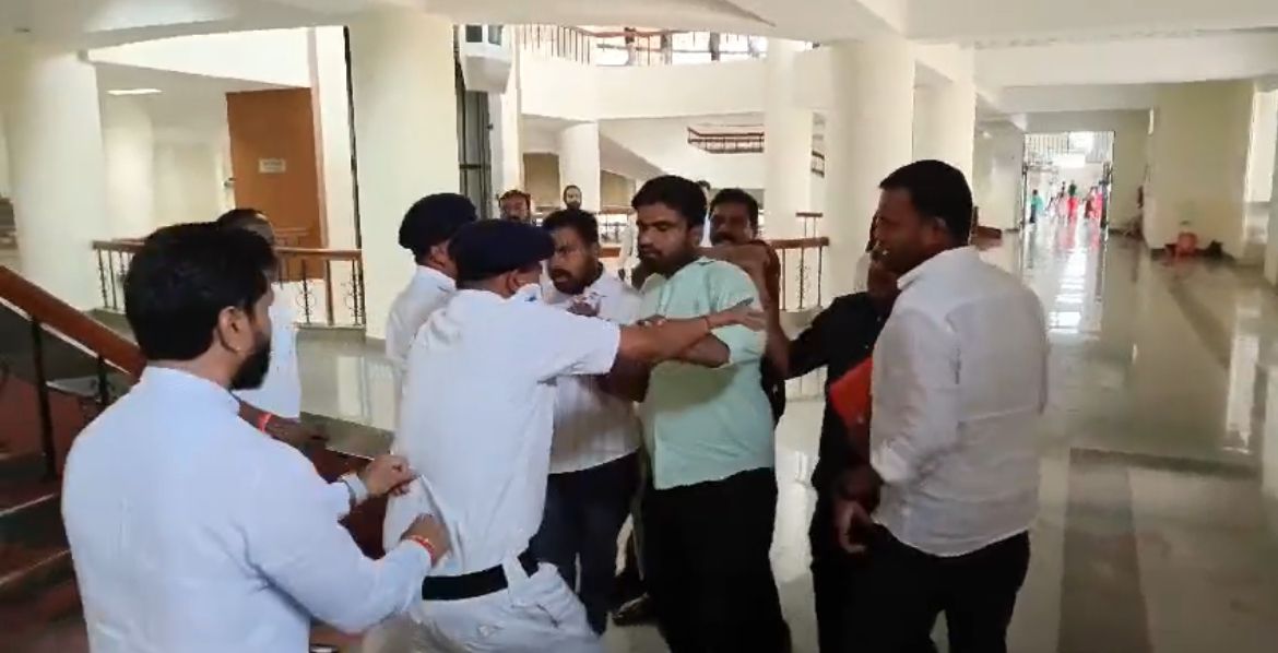 CTRavi BJP Supporters of Minister for Women and Child Welfare Laxmi Hebbalkar trying to attack BJP MLC CT Ravi at Suvarna Vidhana Soudha. (Screengrab)