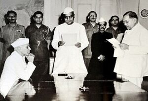 Babasaheb Ambedkar being sworn in as India’s first Law Minister by President Dr Rajendra Prasad on 8 May 1950. Prime Minister Jawaharlal Nehru looks on. (Wikimedia Commons)