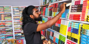 Girish searching for the right book