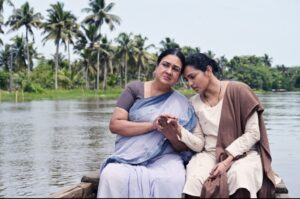 Parvathy Tiruvothu and Urvashi in Ullozhukku 