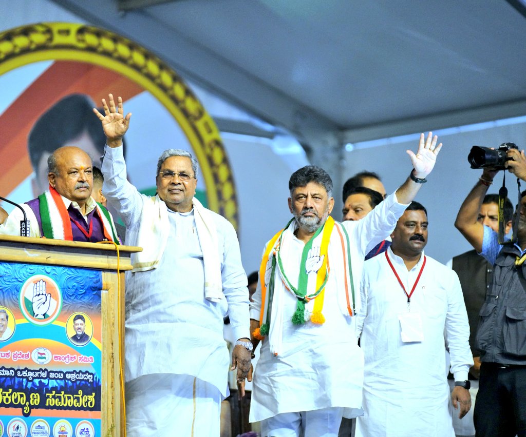 Power Tussle Congress Hassan JD(S) HD Deve Gowda CM Siddaramaiah DyCM DK Shivakumar Janakalyana Samavesha