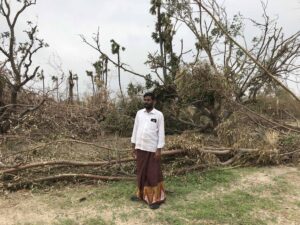 A farmer in Vizhundhamavadi village of Nagapattinam district amid the ruins of his orchard, a week after Cyclone Gaja (Jency Samuel)