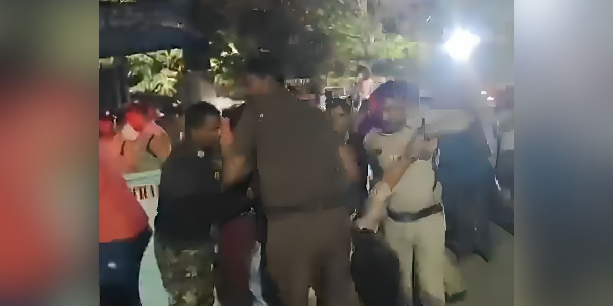 Officials carrying an injured person in Tirupati. Officials carrying an injured person in Tirupati.