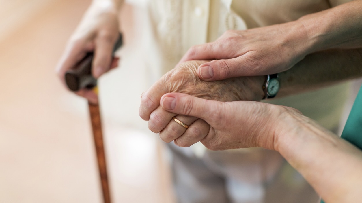 Nurse consoling her elderly patient by holding her hands Kerala moves to establish India’s first Elderly Commission to tackle rapidly ageing population
