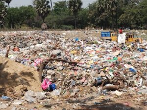 Garbage dumped outside the dumping yard