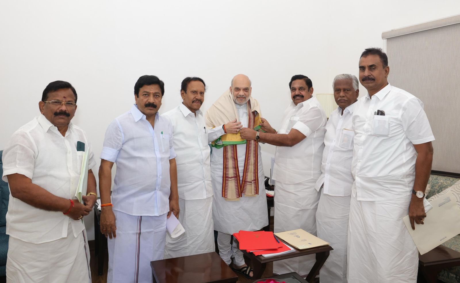 Palaniswamy and other AIADMK leaders with Union Minister Amit Shah in Delhi on Tuesday, 25 March.