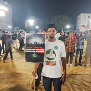 A protestor with a placard
