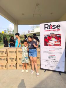Shanaya Goyal and Aditya Shanbhag at the packing event