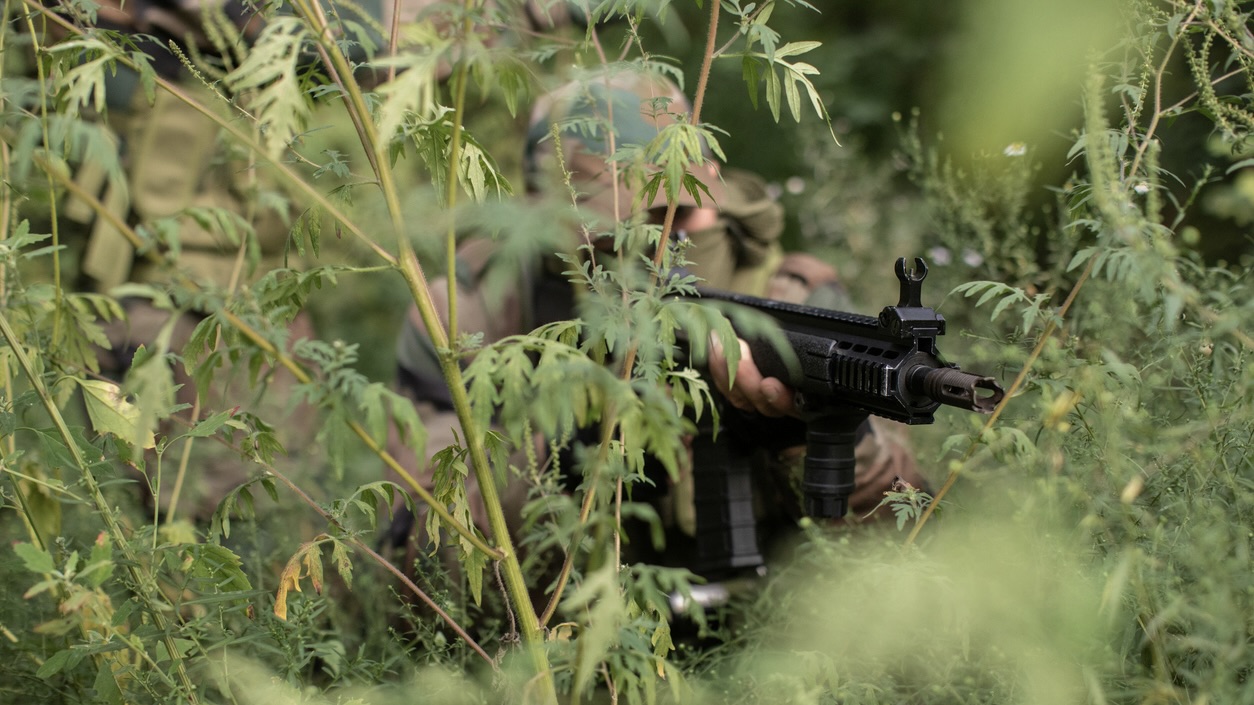 Soldier Hiding In Grass Operation Kagar: Centre hails ‘neutralisation’ of 31 Maoists a historic success in fight against Left Wing Extremism