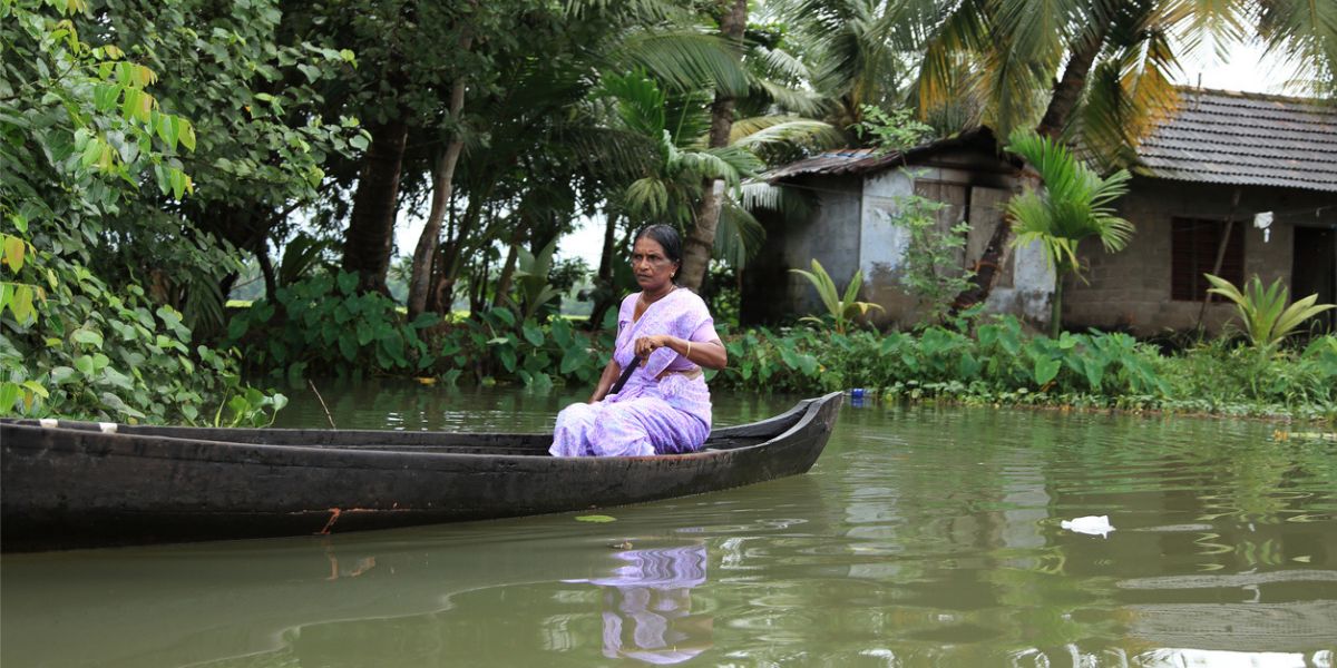 A woman rowing a small boat in the backwaters of Kerala. (iStock) A woman rowing a small boat in the backwaters of Kerala. (iStock)