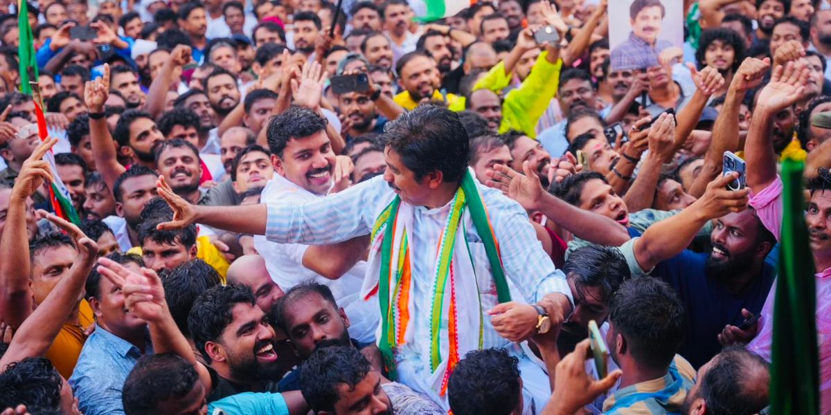 UDF workers lifting their candidate Aryadan Shoukath.