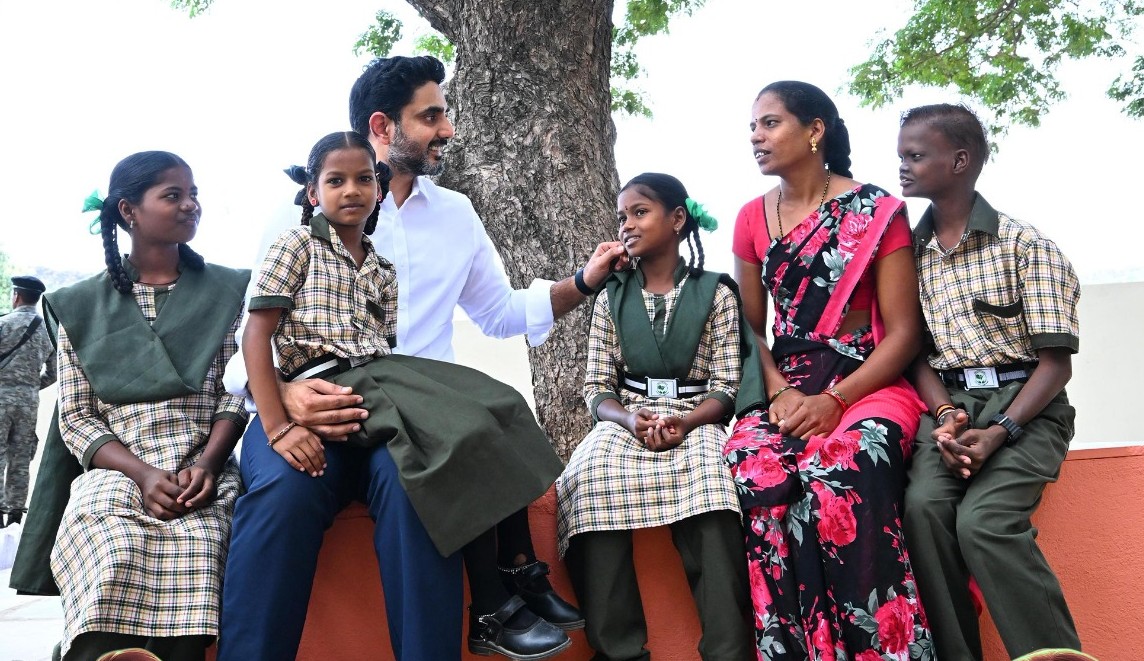 Education Minister Nara Lokesh with students during the Mega Parent-Teacher Meeting.