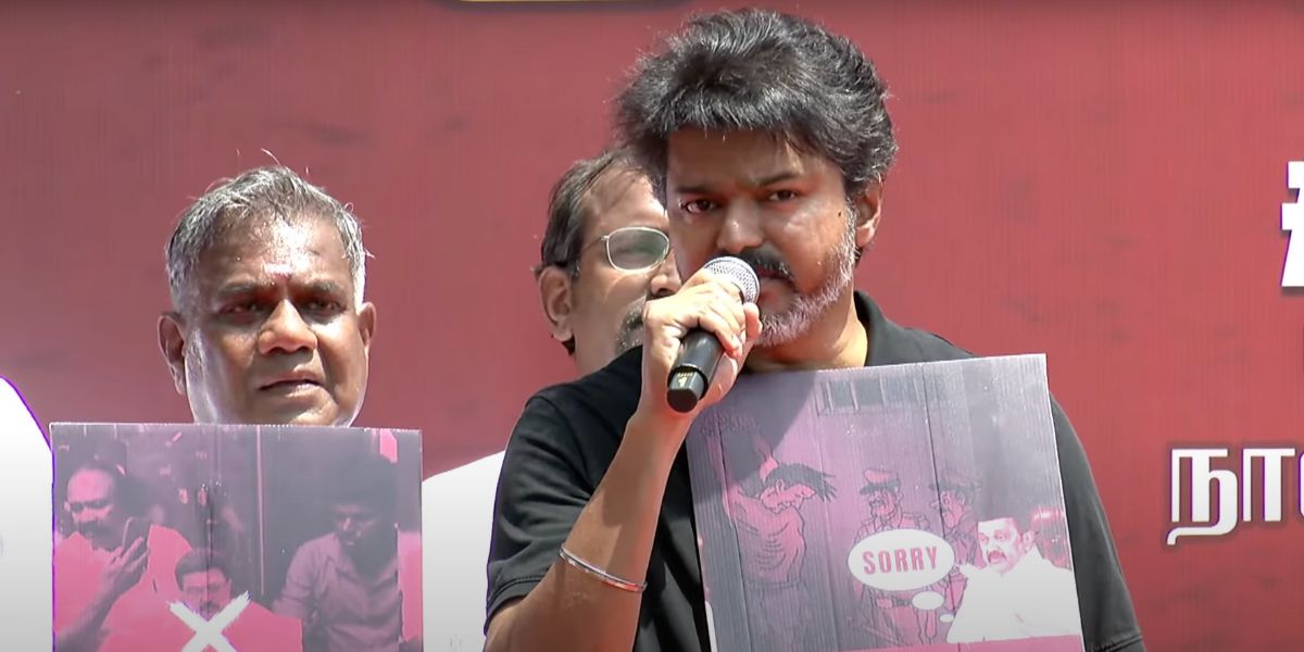 TVK chief Vijay speaking at the protest in Chennai.