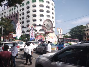 Hoarding inviting the AICC president