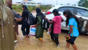 Students being evacuated from the Degree College