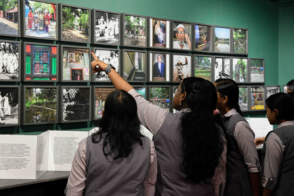 Students at the exhibition on Mahatma Gandhi held at the Lalithakala Akademi in Thrissur. (Supplied)