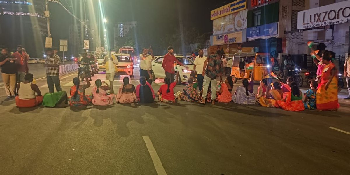 Protestors blocking a road in Chennai.