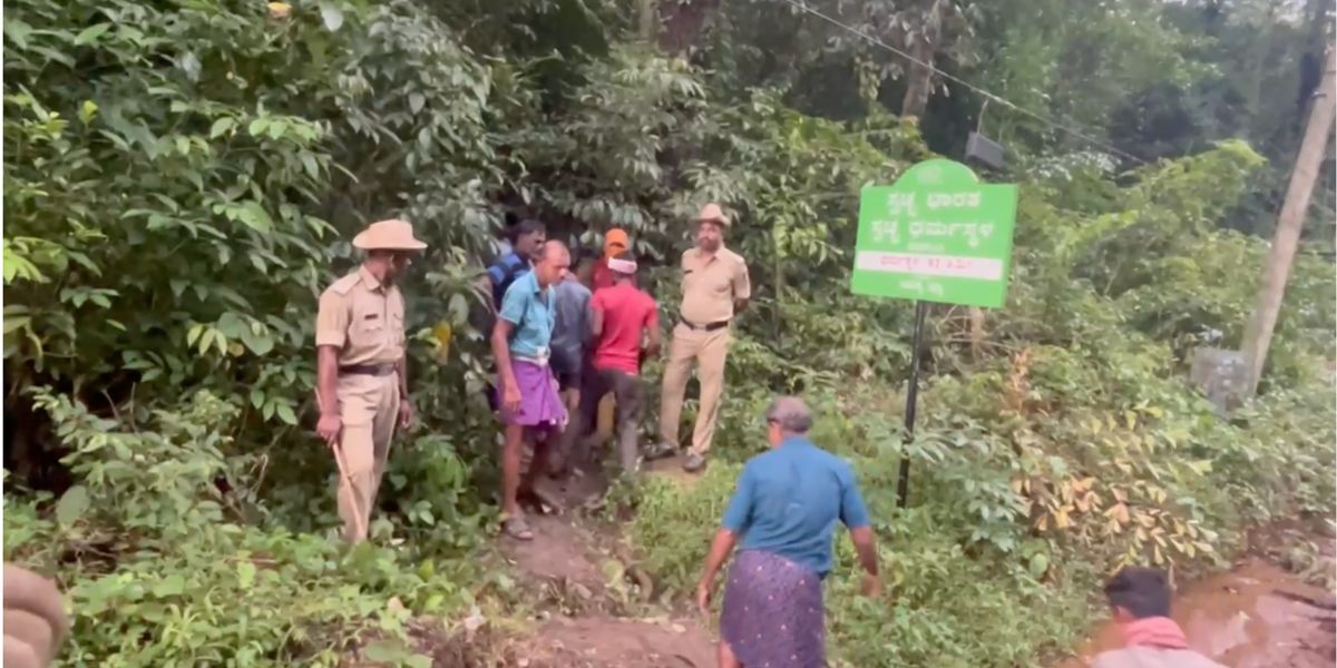 The police team during the exhumation process in Dharmasthala.