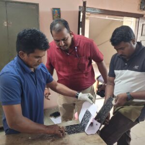 Personnel working on the inscription copying process