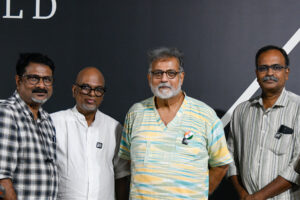 Poet PN Gopikrishnan, Murali Cheeroth, and Sudheesh Yezhuvoth with Thushar Gandhi (second right).