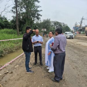 Bengaluru East Commissioner visiting the Panathur–Balagere road a day after the accident.