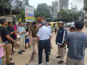 Residents protesting at Varthur Road against bad road conditions.