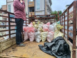 Sacks of groceries being distributed in GR Colony
