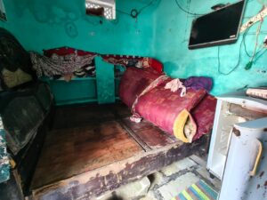The damaged matress and fridge at Mehdi's house