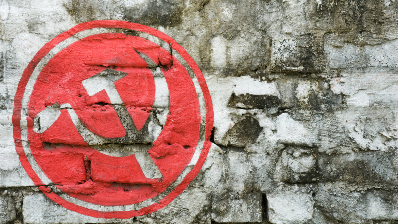 CPI (Maoist) alleged ‘fake’ press release claims readiness to surrender arms CPI(M) party symbol. Credit: iStock