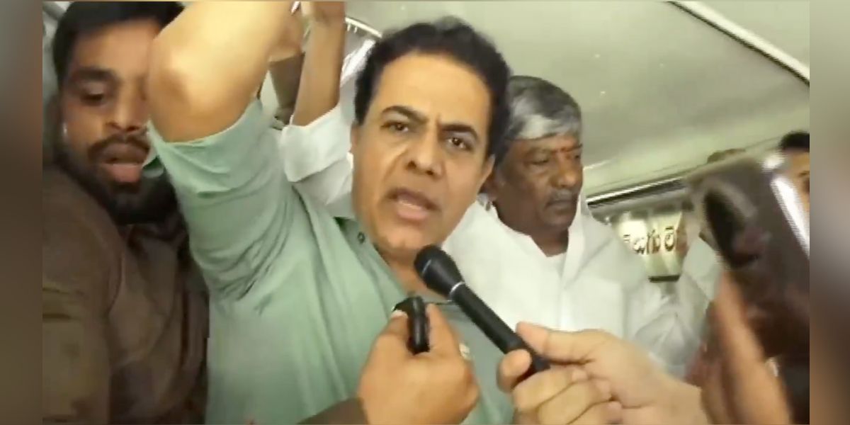 KTR on a TGSRTC bus protesting against the fare hike.