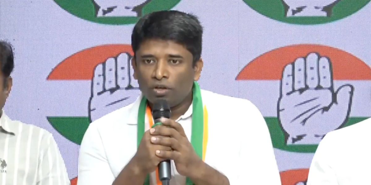 Kannan Gopinathan speaking to reporters after joining the Congress
